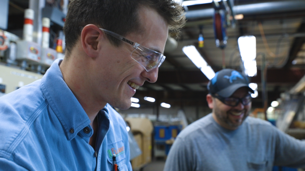 FloraCraft team members inspect product.